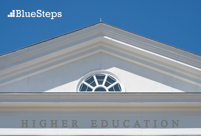 Higher Education on a white building and blue sky